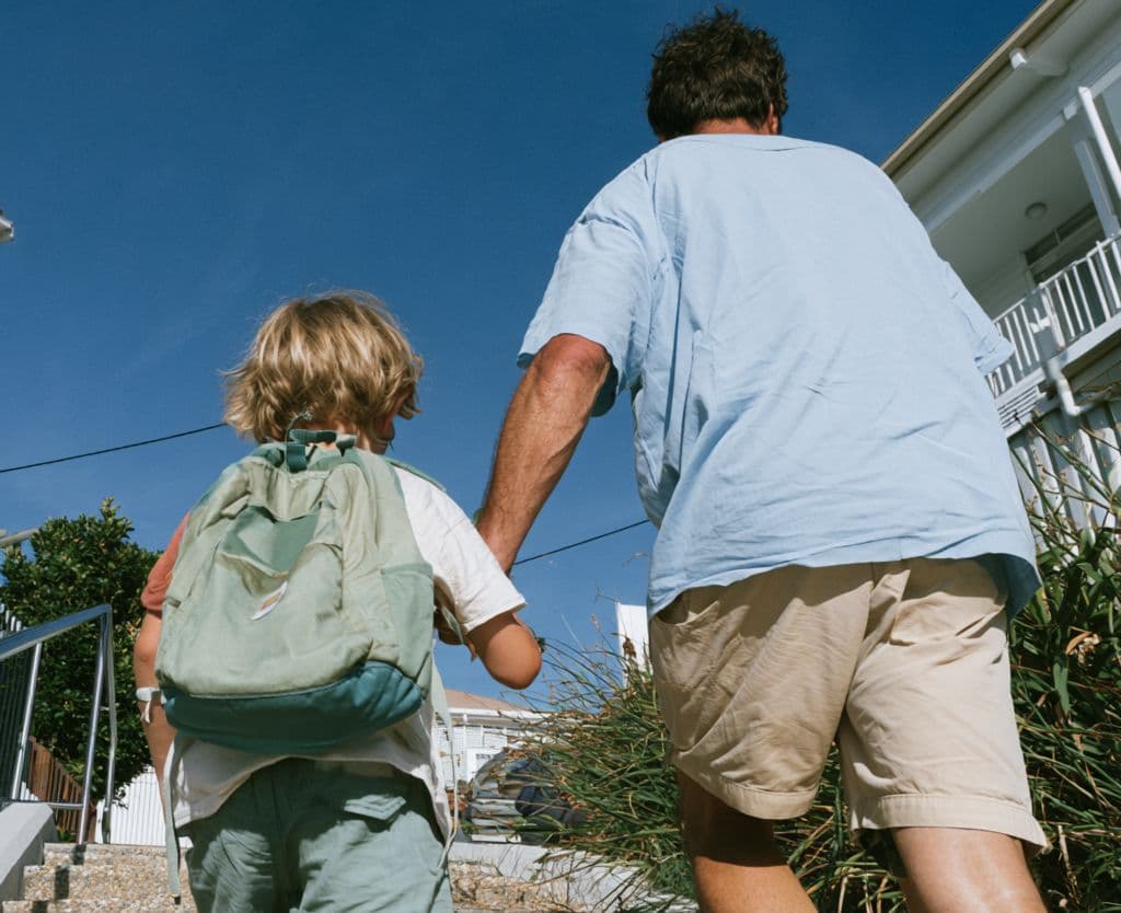 Parent and child walking together